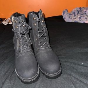 Black Boots With Gold Detailing